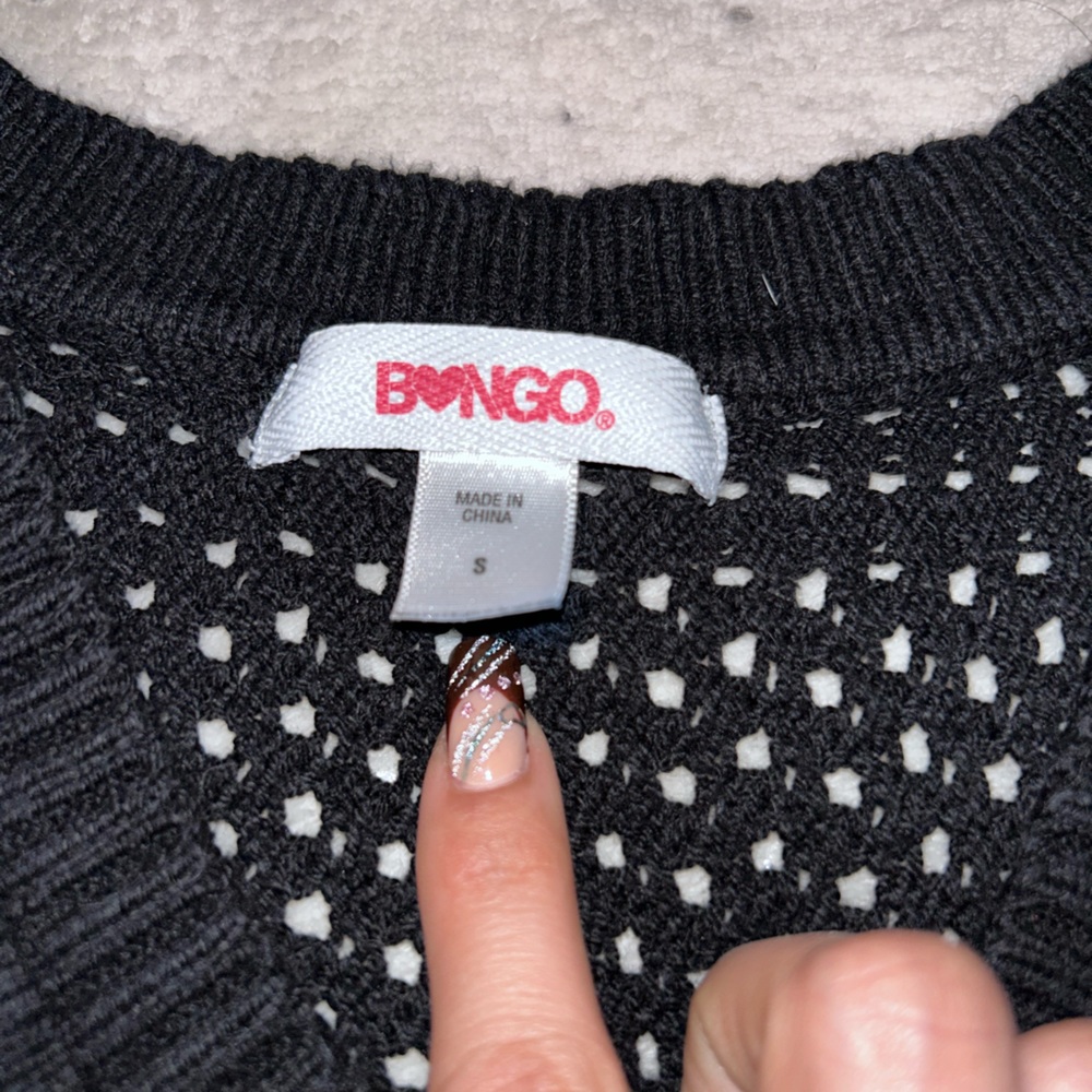 Black knitted crop top.